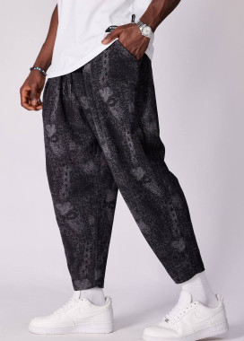 Стильні штани вільного крою звужені до низу чорно-сірі MFStore Изображение Стильні штани вільного крою звужені до низу чорно-сірі MFStore