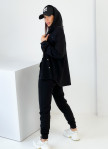 Изображение Женский черный костюм с накладными карманами