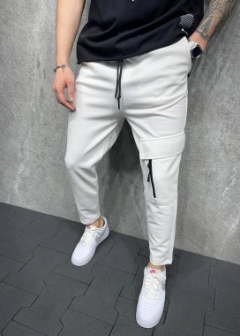 Штани білі спортивні з накладною кишенею на лівій нозі MFStore Изображение Штани білі спортивні з накладною кишенею на лівій нозі MFStore