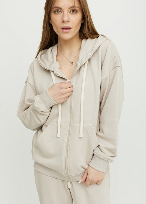 Бежевый спортивный костюм свободного кроя Изображение Бежевый спортивный костюм свободного кроя