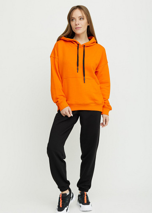 Черно-оранжевый женский костюм Изображение Черно-оранжевый женский костюм