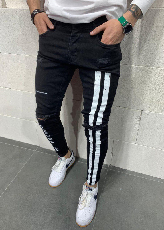 Зауженные джинсы с вертикальными белыми полосами Изображение Зауженные джинсы с вертикальными белыми полосами