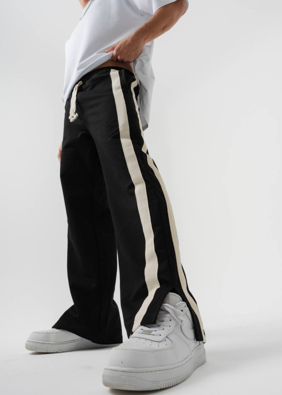 Стильні багі штани з розрізами і лампасами чорні MFStore Изображение Стильні багі штани з розрізами і лампасами чорні MFStore