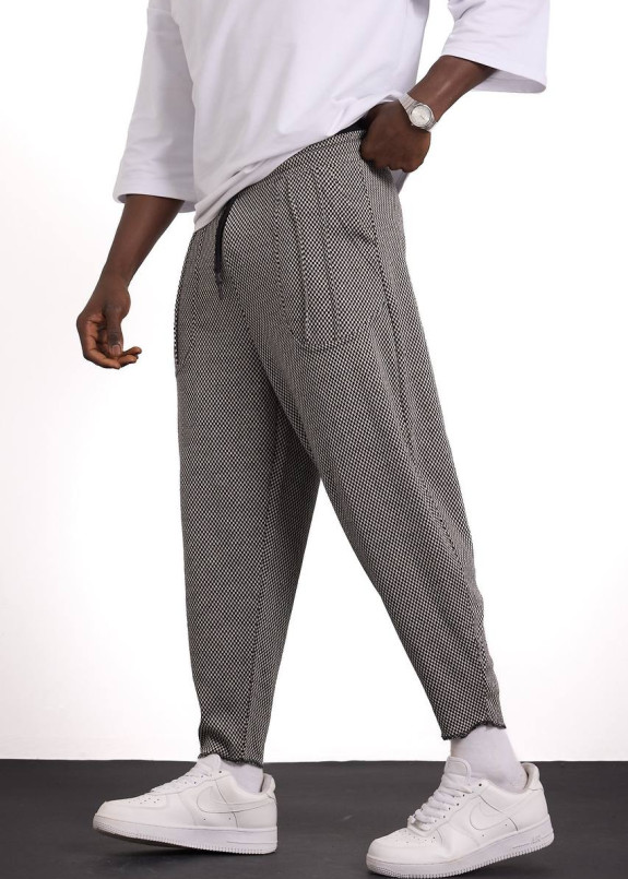 Cтильні штани вільного крою з накладними карманами світлі MFStore Изображение Cтильні штани вільного крою з накладними карманами світлі MFStore