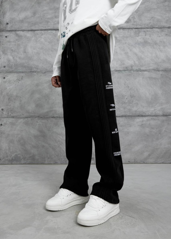 Стильні штани багі з текстом по бокам MFStore Изображение Стильні штани багі з текстом по бокам MFStore