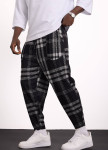 Стильні штани в клітинку вільного крою MFStore Изображение Стильні штани в клітинку вільного крою MFStore