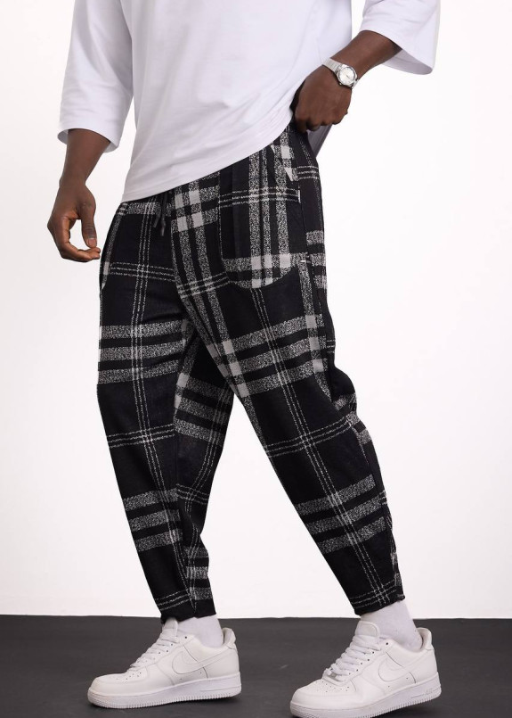 Стильні штани в клітинку вільного крою MFStore Изображение Стильні штани в клітинку вільного крою MFStore
