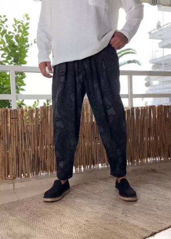 Стильні штани вільного крою звужені до низу чорно-сірі MFStore Изображение Стильні штани вільного крою звужені до низу чорно-сірі MFStore