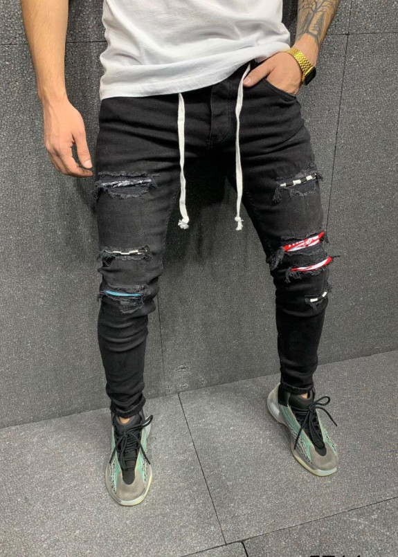 Джинсы с имитацией дырок и цветными вставками MFStore Изображение Джинсы с имитацией дырок и цветными вставками MFStore