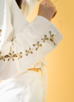 Изображение Женский костюм белый с завязками