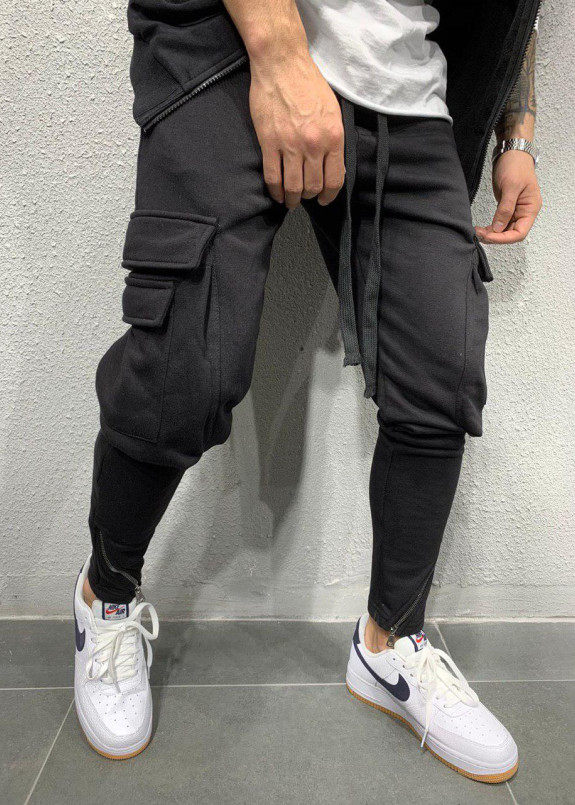 Брюки спортивные с карманами по бокам и косой молнией MFStore Изображение Брюки спортивные с карманами по бокам и косой молнией MFStore