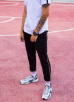 Спортивные штаны с полосками мужские черные Кейдж Tur streetwear Изображение Спортивные штаны с полосками мужские черные Кейдж Tur streetwear