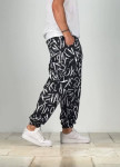 Стильні штани вільного крою з малюнками чорно-білі MFStore Изображение Стильні штани вільного крою з малюнками чорно-білі MFStore