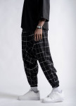 Стильні штани вільного крою галіфе у клітинку чорні MFStore Изображение Стильні штани вільного крою галіфе у клітинку чорні MFStore