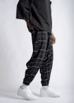 Стильні штани вільного крою галіфе у клітинку чорні MFStore Изображение Стильні штани вільного крою галіфе у клітинку чорні MFStore