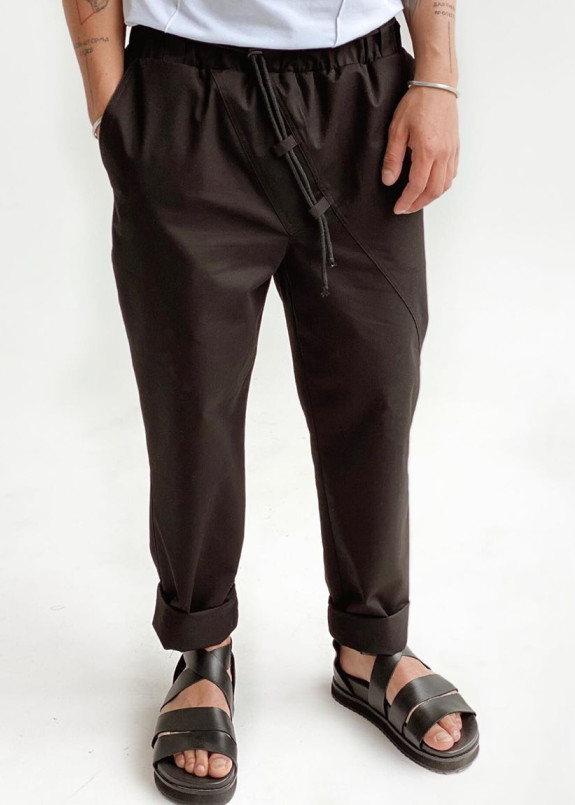 Черные дизайнерские брюки Изображение Черные дизайнерские брюки