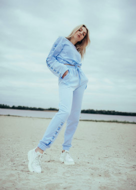 Женский костюм голубой с шнуровкой Изображение Женский костюм голубой с шнуровкой