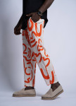 Штани вільного крою з помаранчевим малюнком MFStore Изображение Штани вільного крою з помаранчевим малюнком MFStore