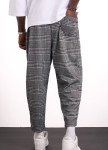 Стильні брючні штани з накладними карманами в клітинку сірі MFStore Изображение Стильні брючні штани з накладними карманами в клітинку сірі MFStore